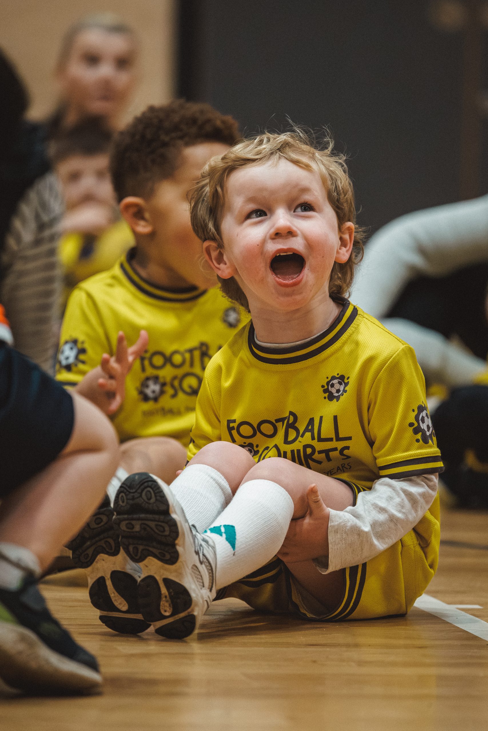 Children enjoying football